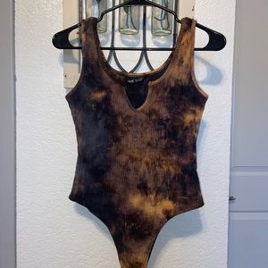 a tie-dye body suit- just bought worn once-
